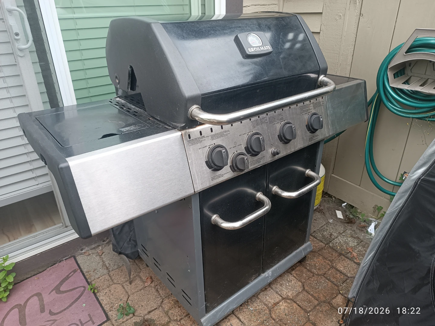 Broilmate 4-Burner Propane BBQ with Side Burner