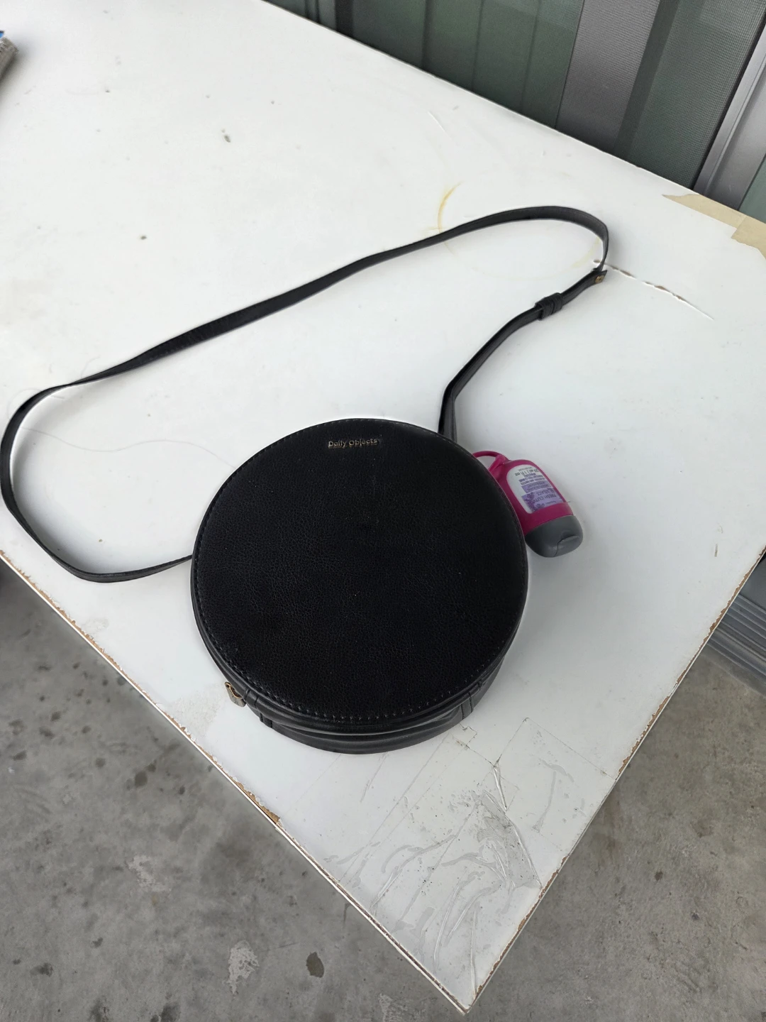 Daily Objects Black Round Crossbody Bag