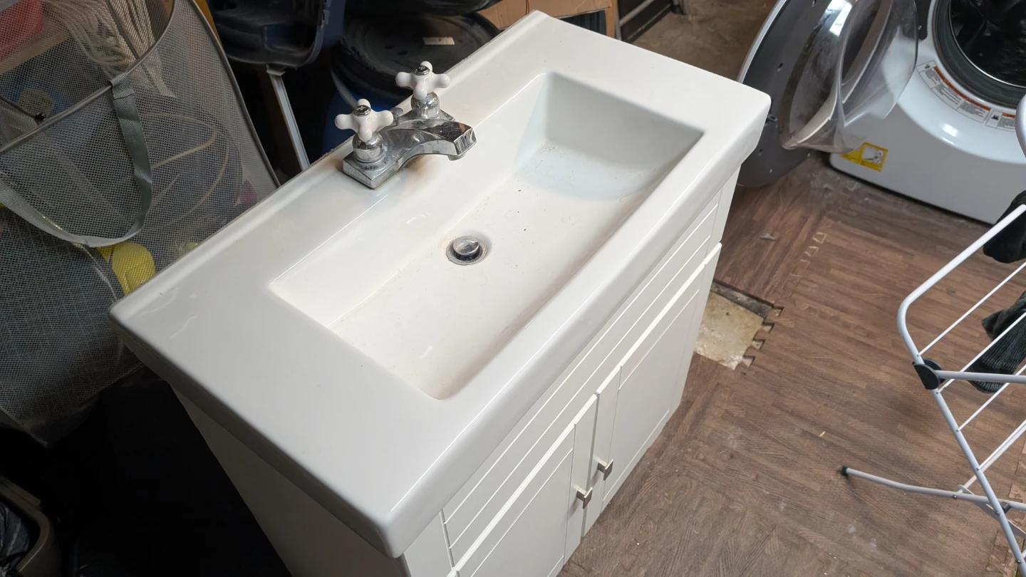 White Bathroom Vanity with Sink and Faucet