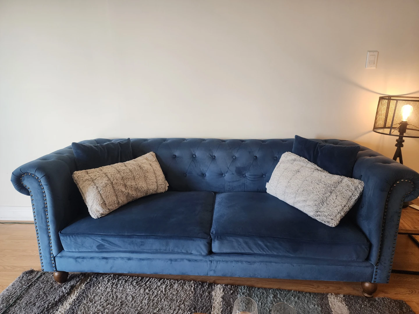 Blue Tufted Sofa