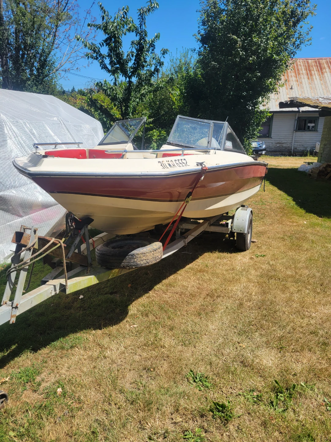 Vintage Glastron Boat with Evinrude Motor