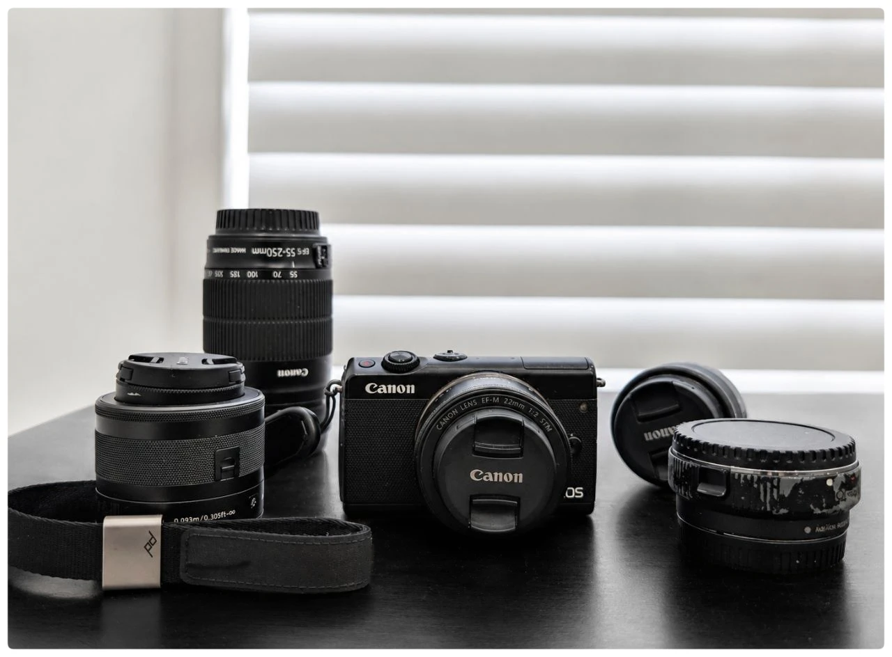 Canon EOS M100 Mirrorless + 3 Lenses, Adapter & Bag