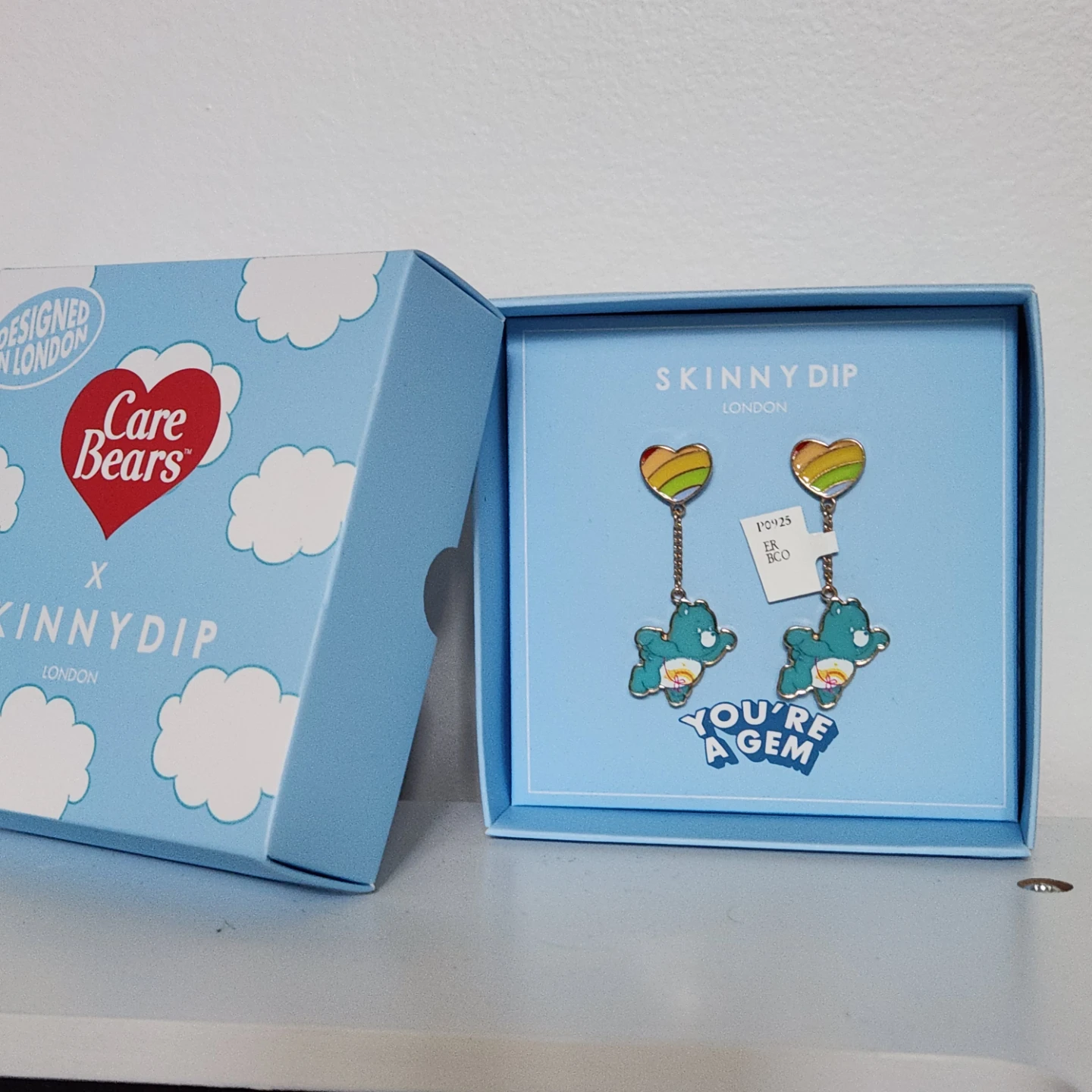 New in box Skinnydip x Care Bears Teal Heart Drop Earrings