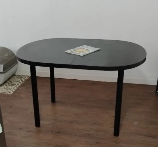 Minimalist Oval Black Dining Table