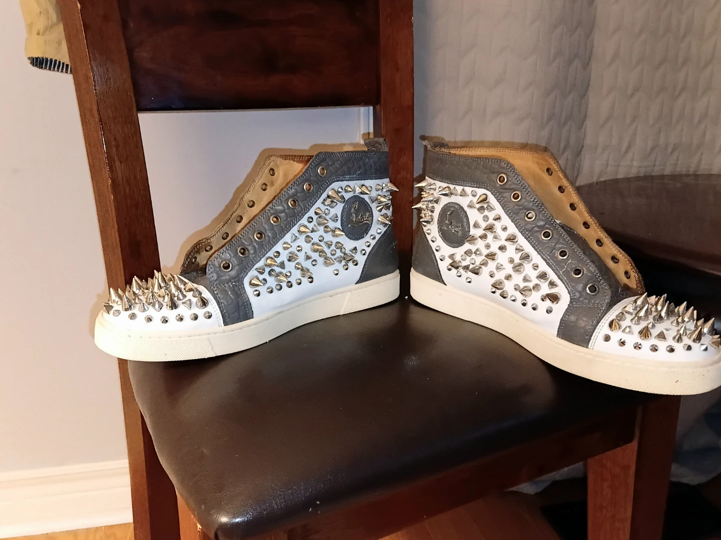 Christian Louboutin Spiked red bottom sneakers - photo 2