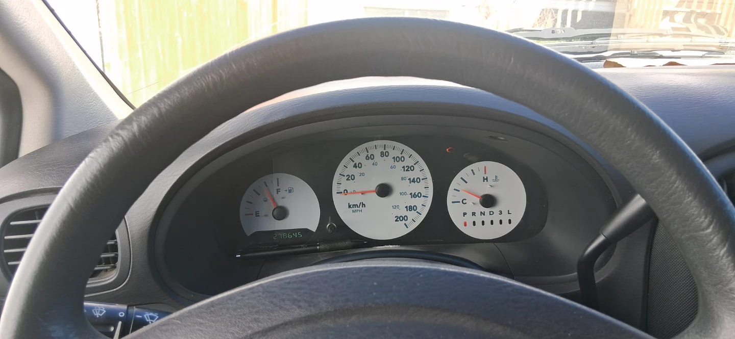 Black Dodge Caravan Minivan - photo 4