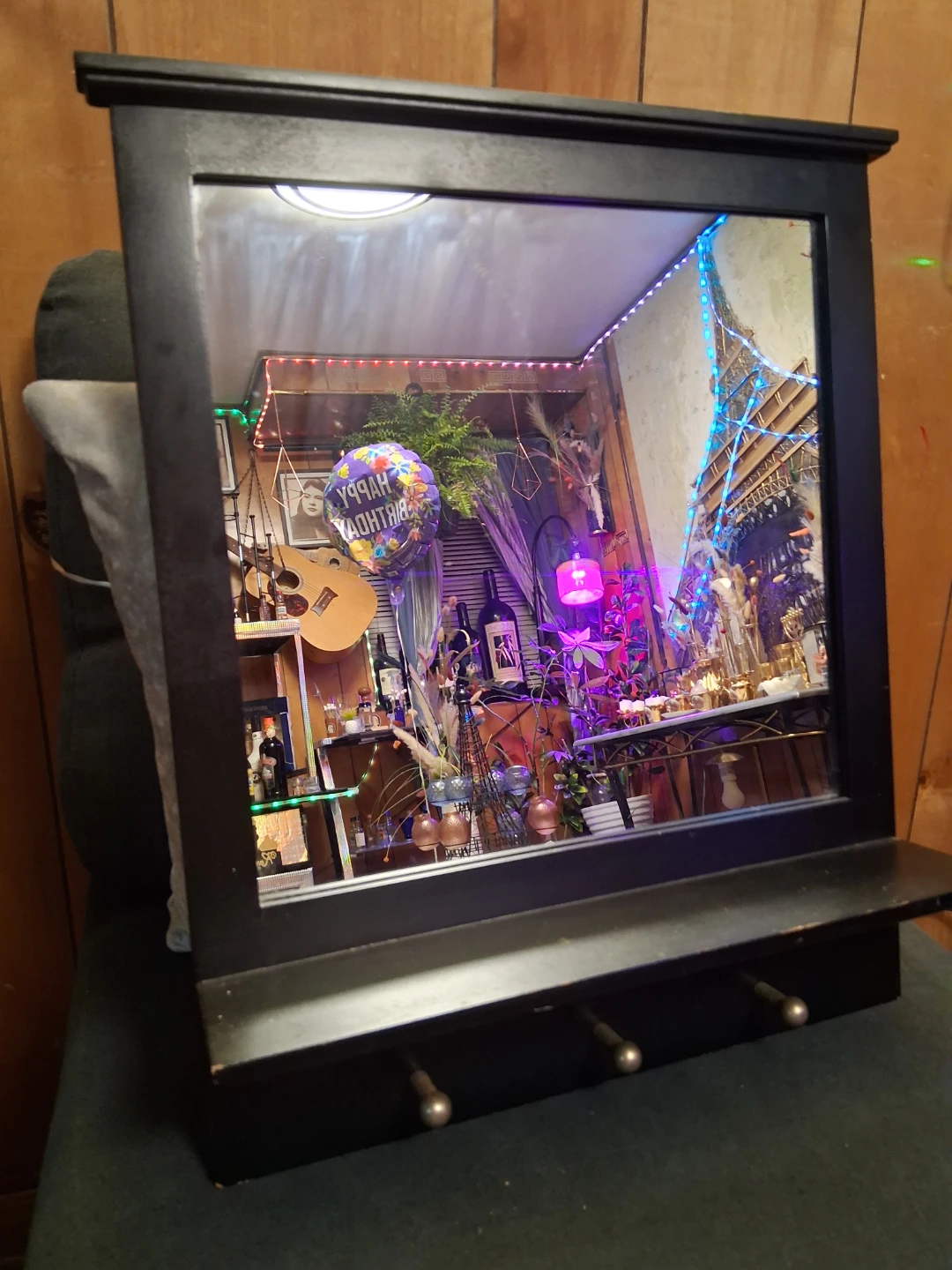 Wall mounted display mirror with hooks