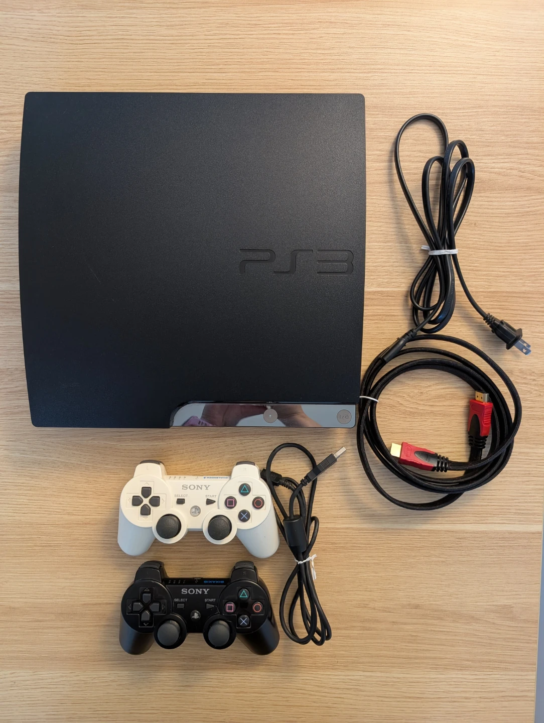 PS3 Slim 320GB + 5 games