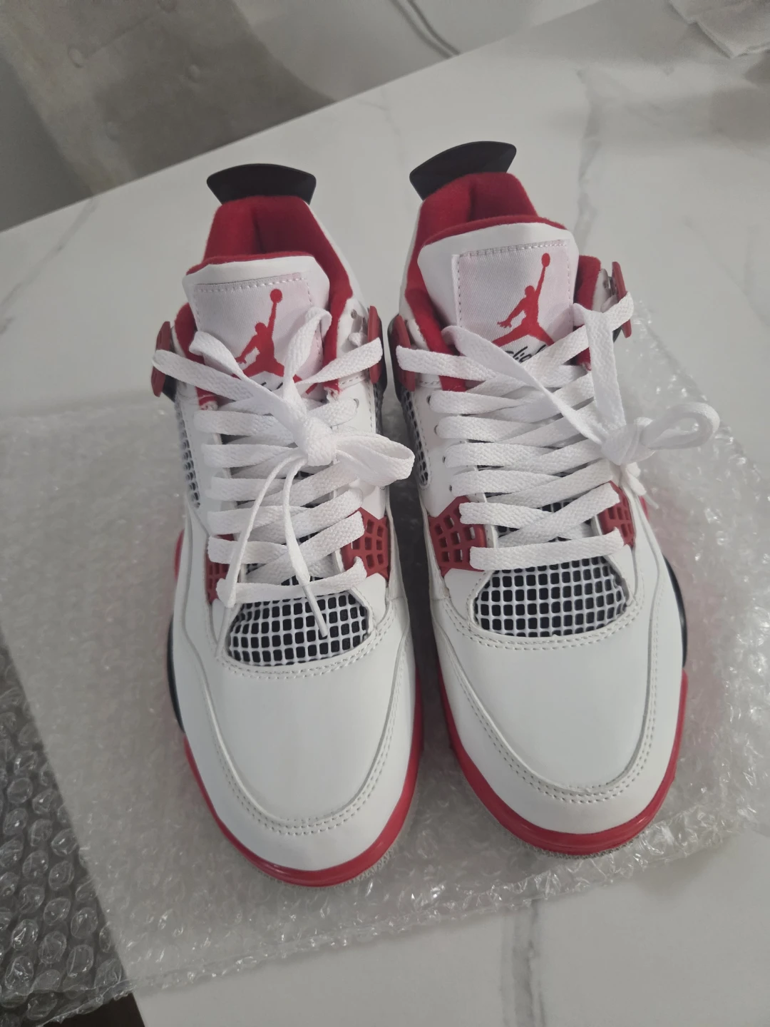 Air Jordan 4 Red White Black Sneakers