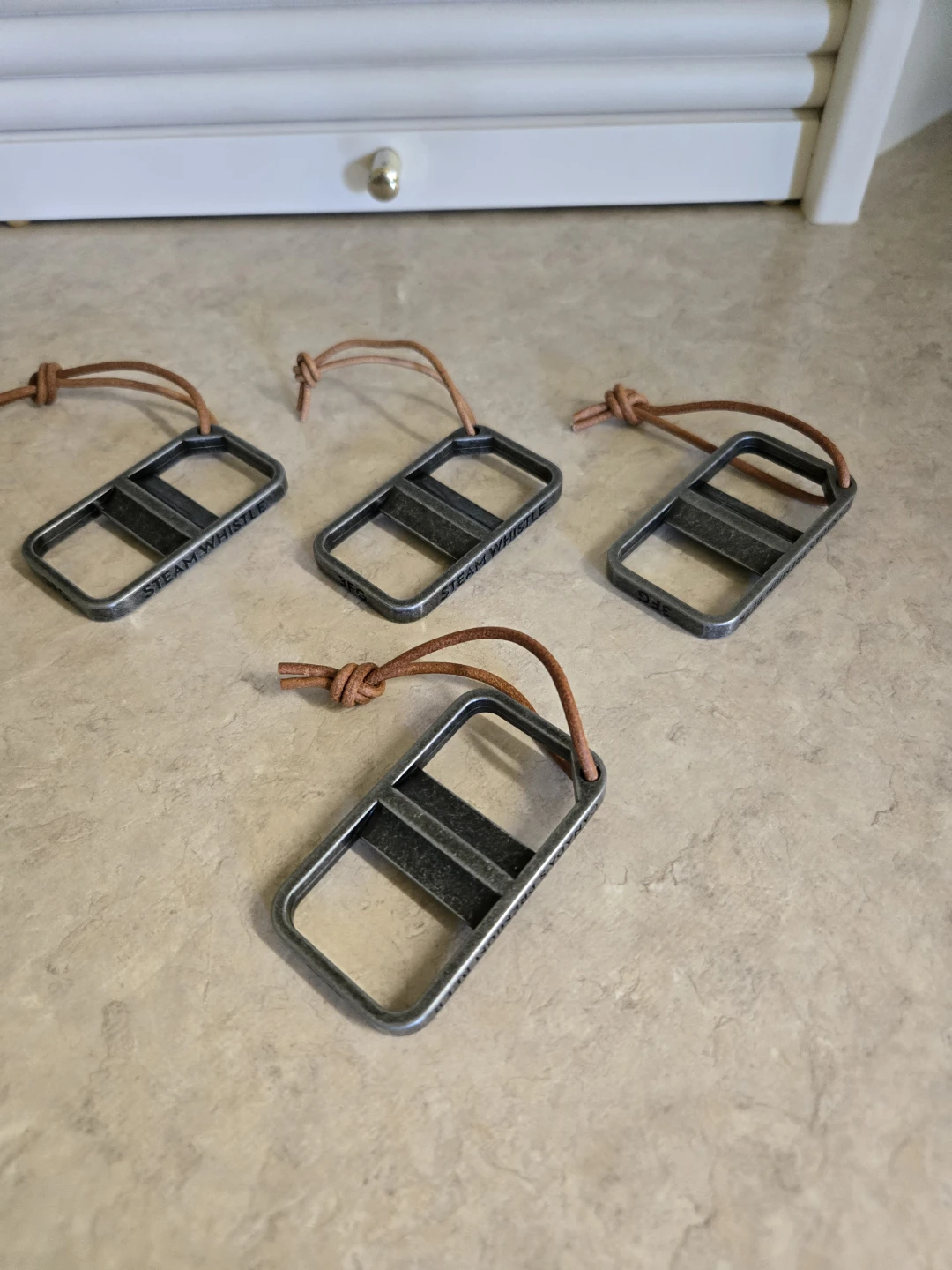 New. Steam Whistle Metal Keychain Bottle Openers (Set of 4)