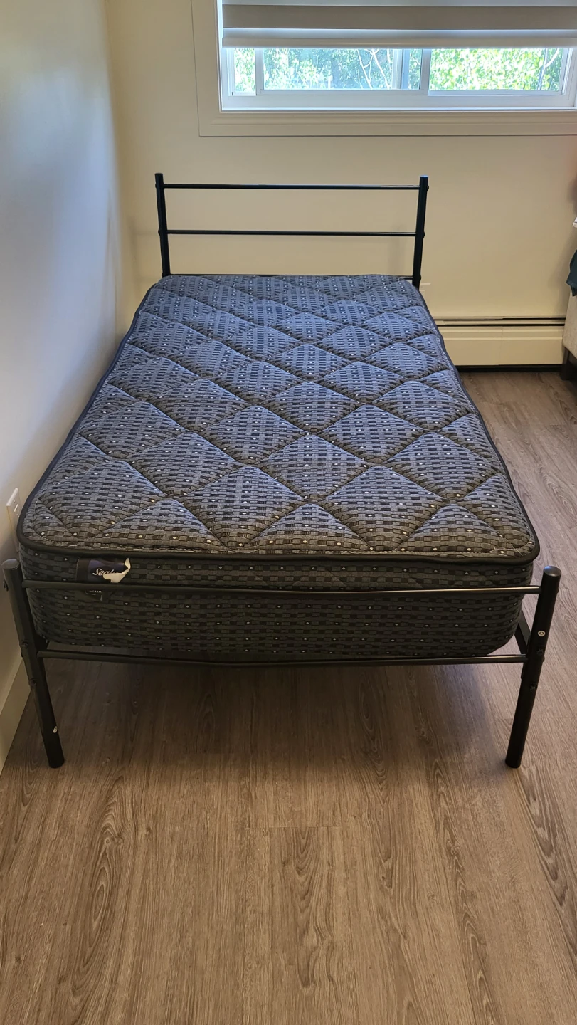 Sealy Posturepedic Twin mattress with bed frame