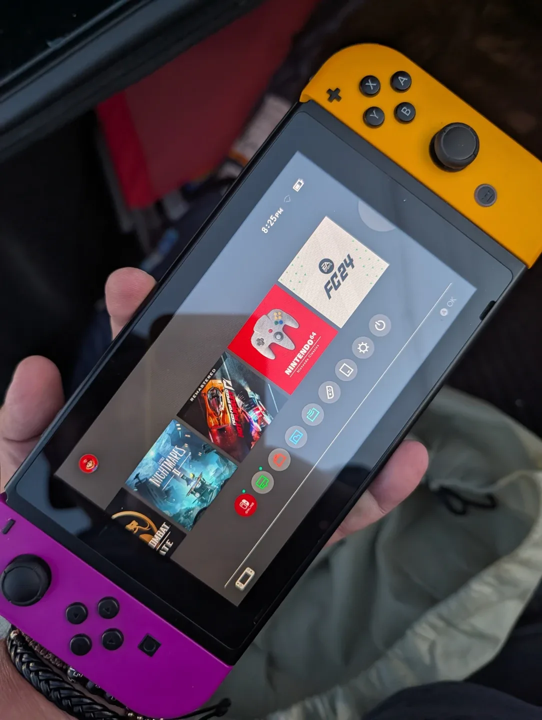 Nintendo Switch 1 Console with Purple and Yellow Joy-Cons - photo 3