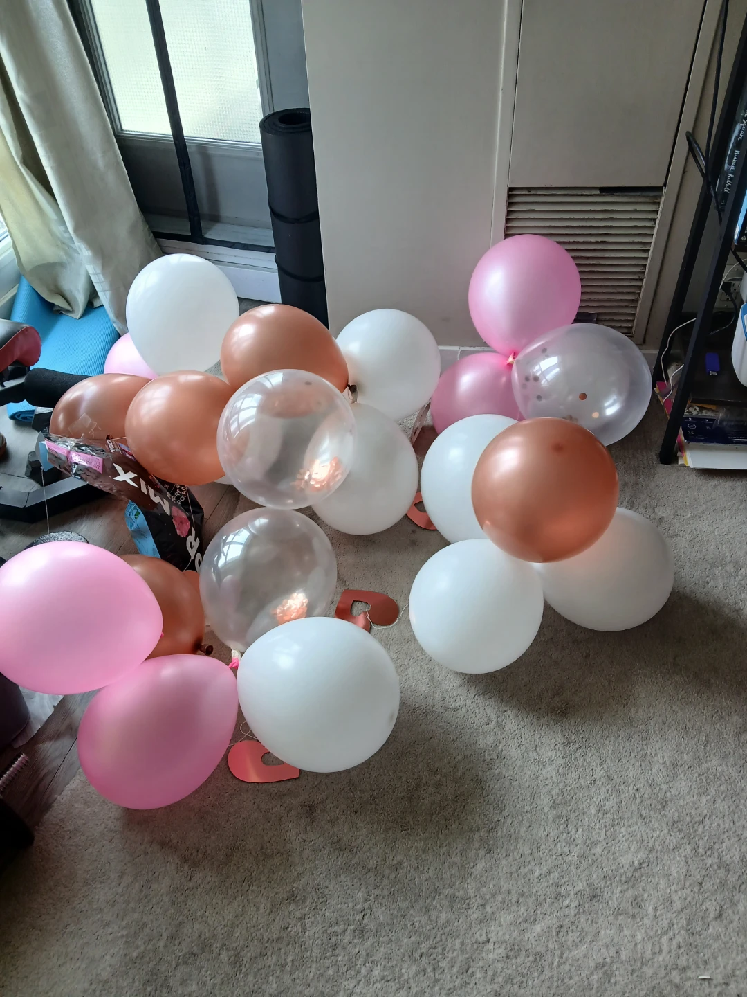 Balloons - white, pink, brownish(?)