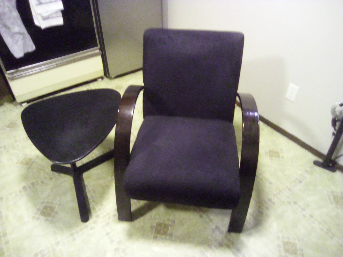 Black suede chair and side table