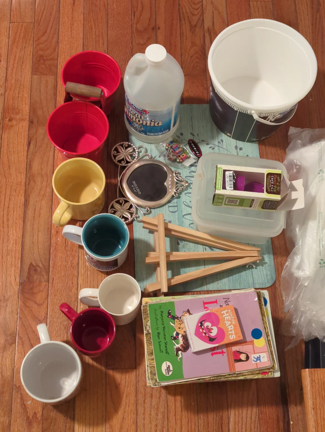 Assorted Mugs, Buckets, Books, and More