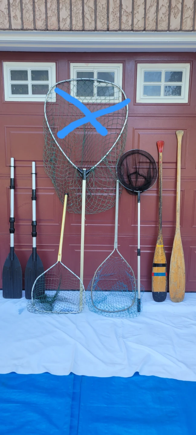 Assorted Fishing Nets and Oars