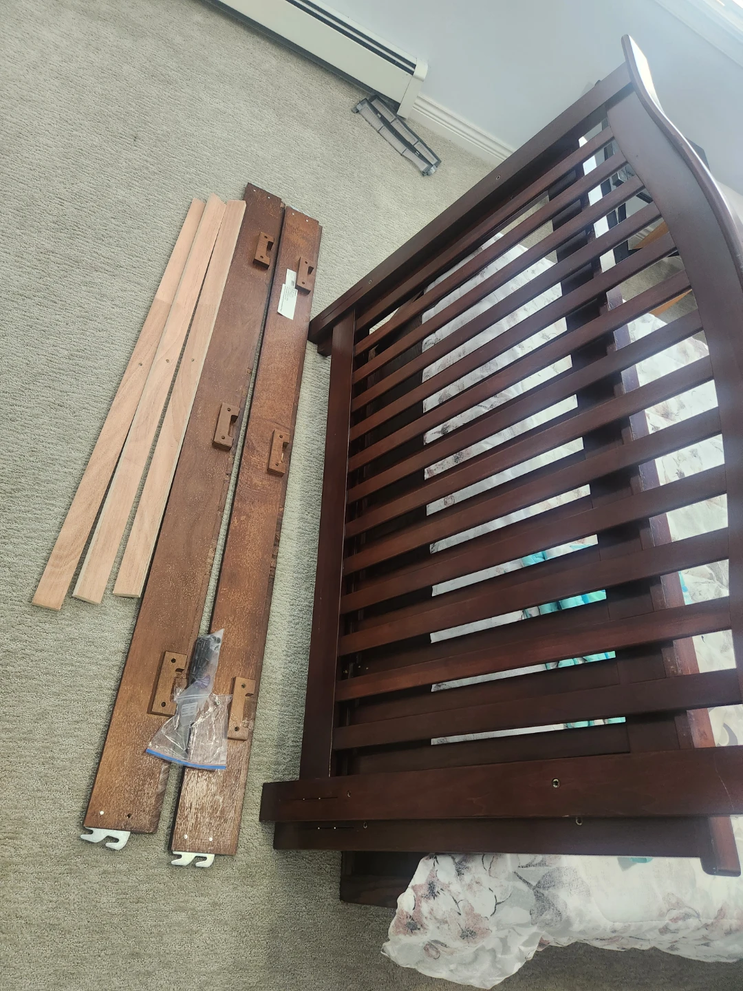Wooden Crib converts to full bed.