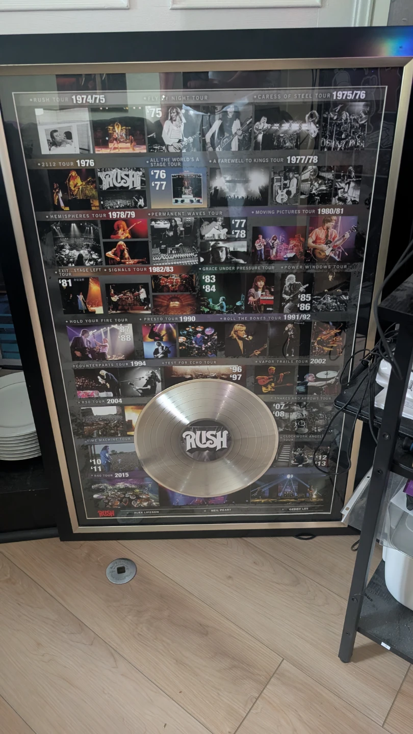 Rush Tour Memorabilia Display with Gold Record