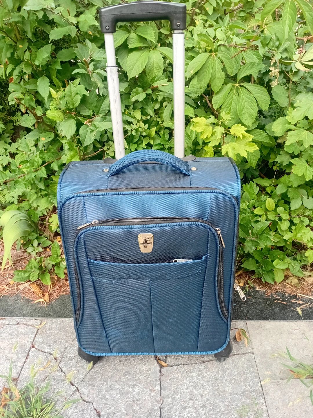 Delsey Blue Rolling Luggage