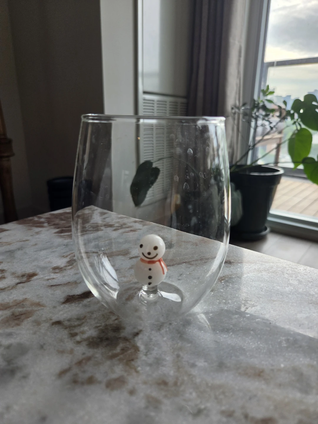 Wine glass with snowman