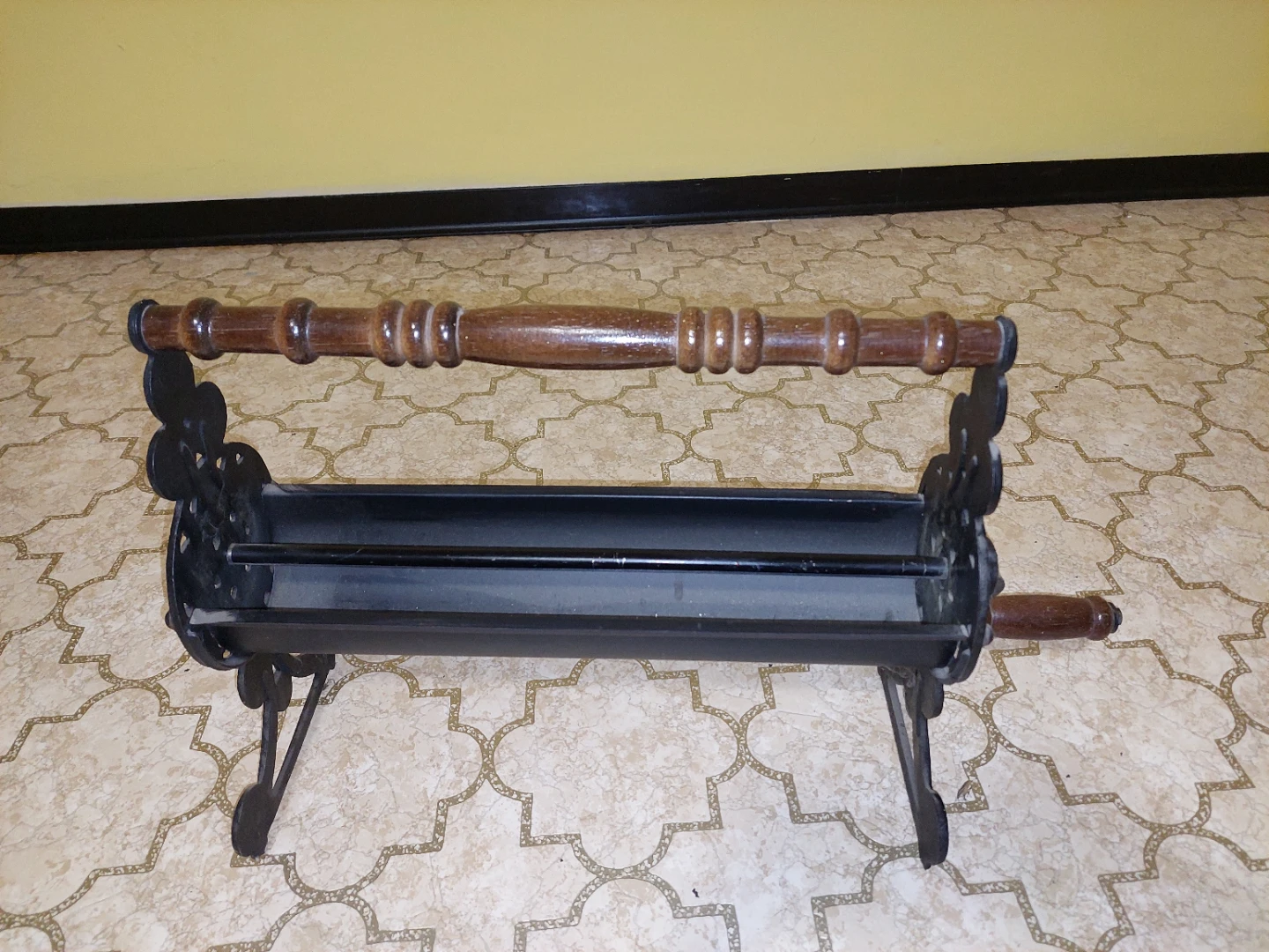 Vintage Cast Iron Newspaper Log Roller