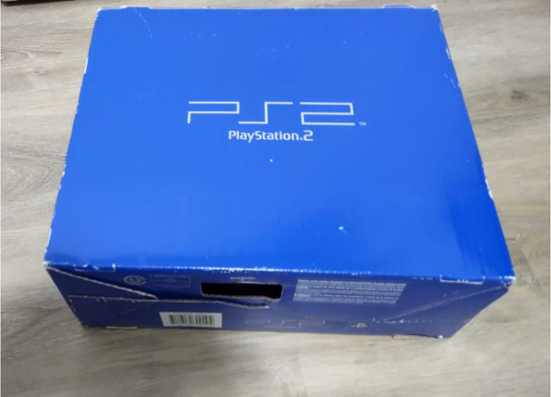 PlayStation 2 Console with 3 games, memory and 2 controllers