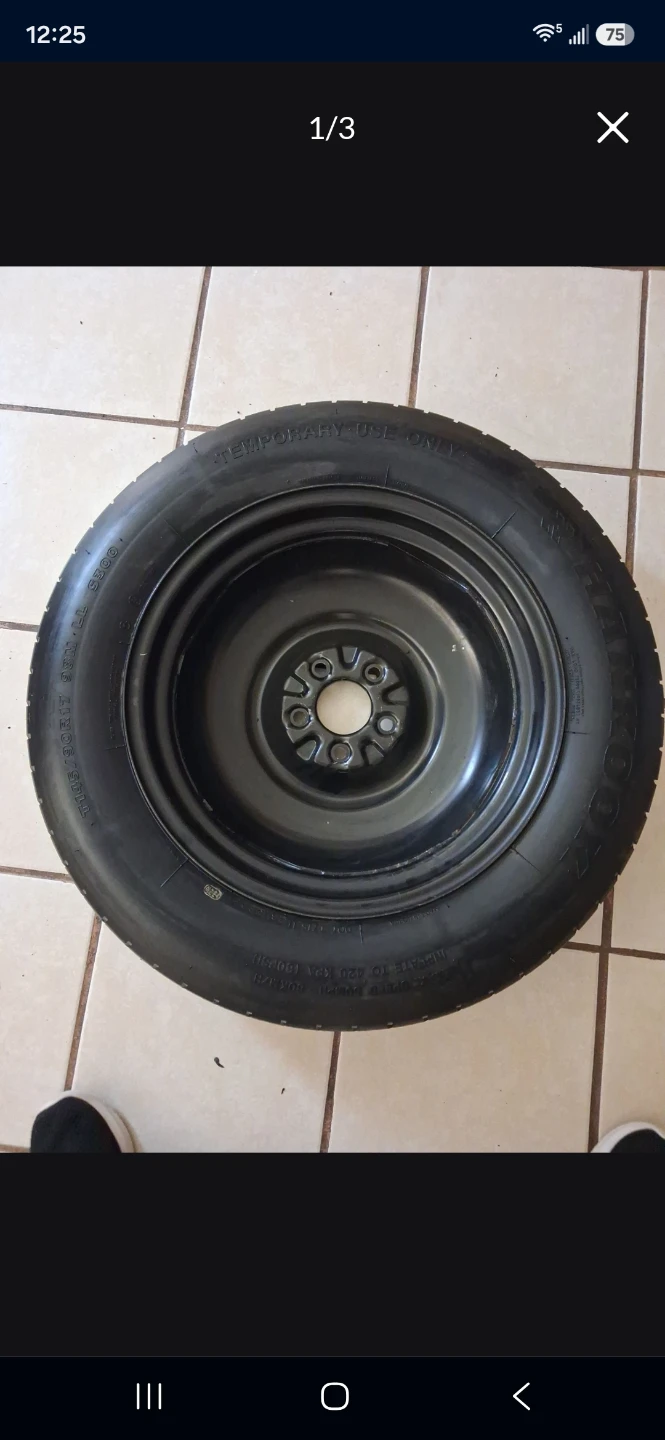 Car Jack and Spare Tire - photo 2