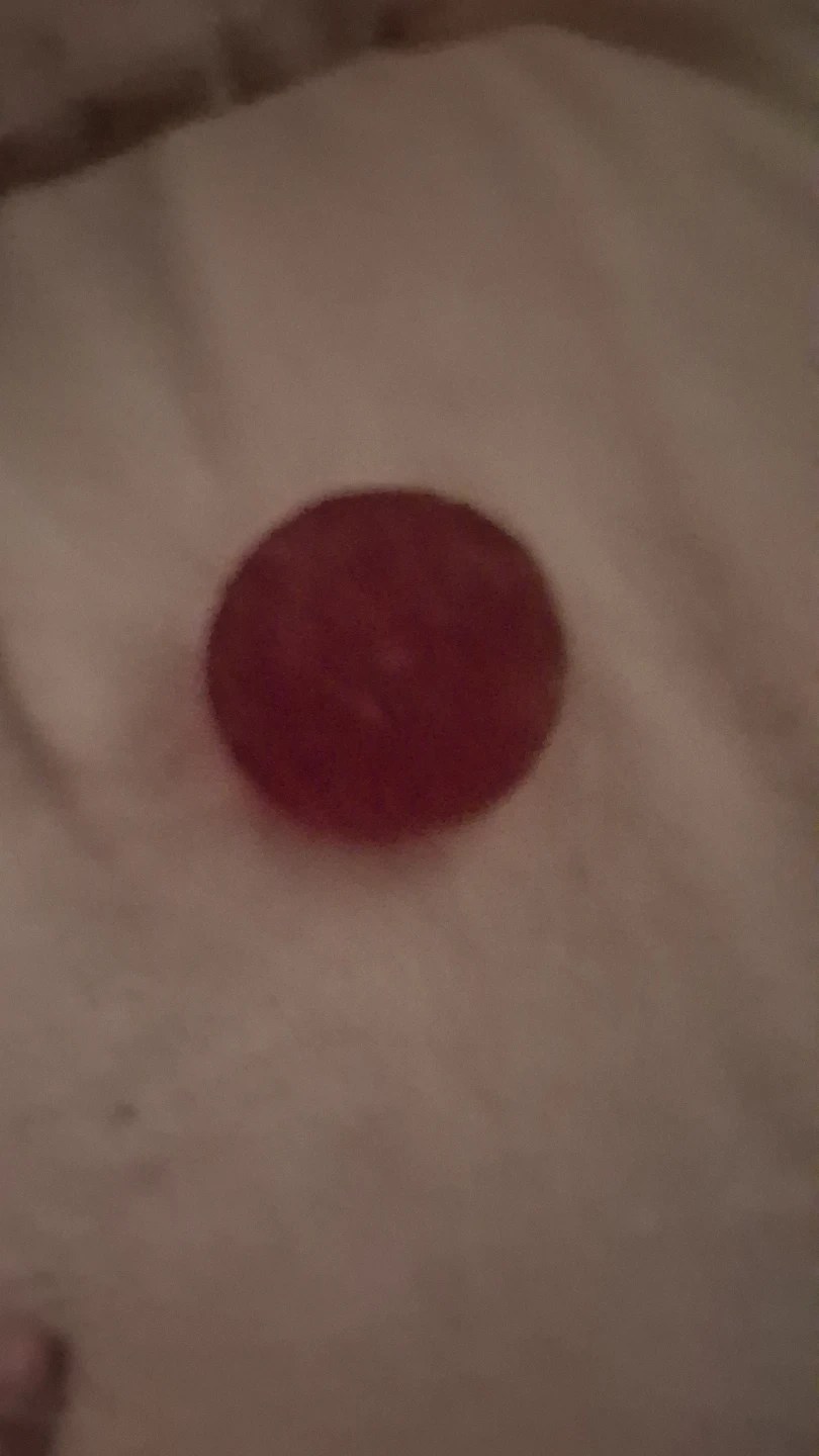 A red taba squishy ball