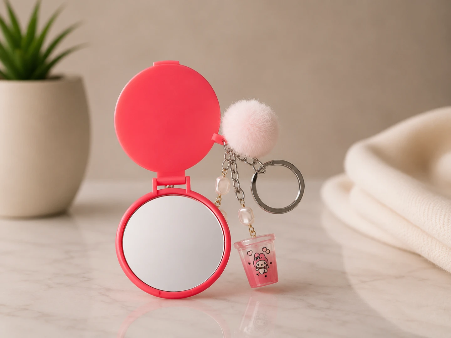 Miroir de poche porte-clés avec pompon