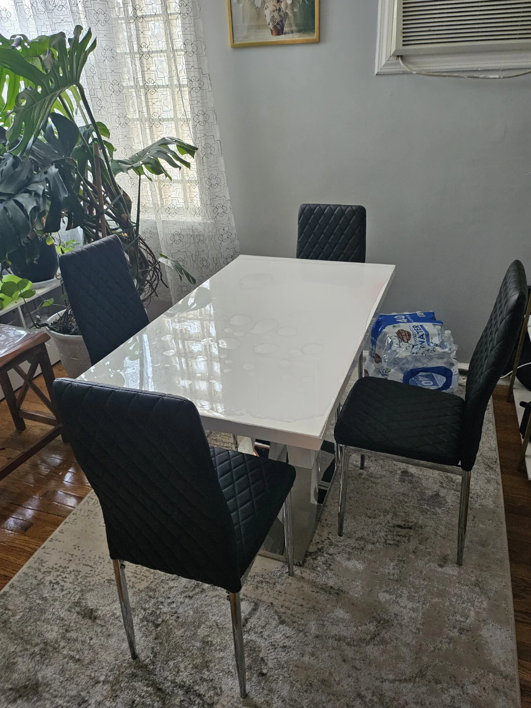 White Dining Table with 4 Black Chairs