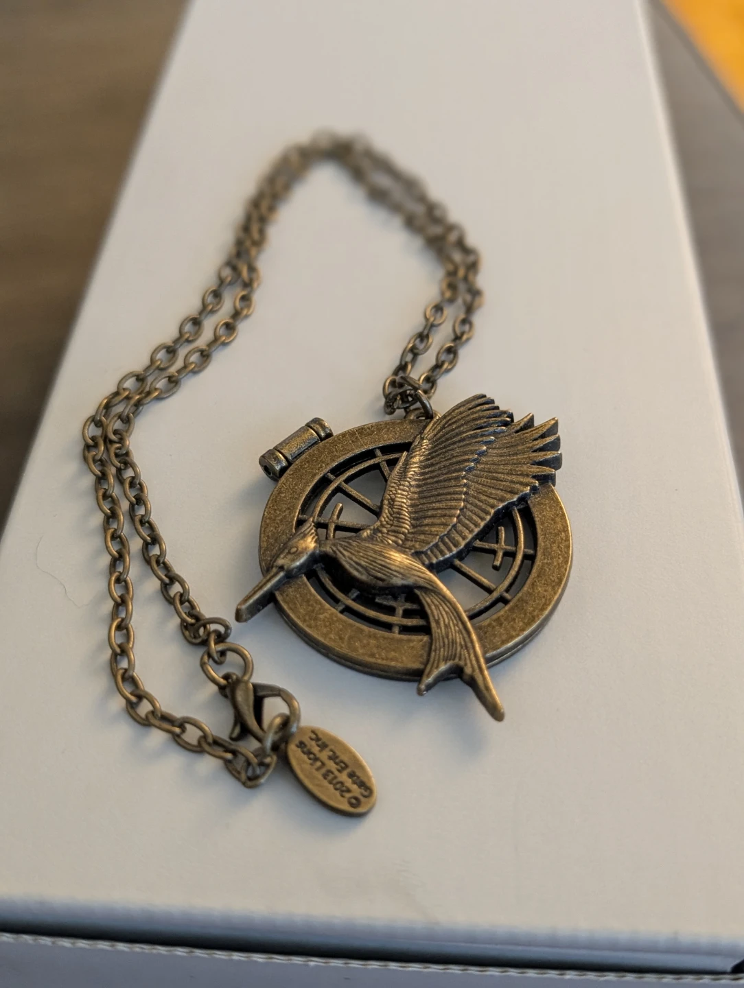Official Hunger Games Catching Fire Flip Necklace (NECA)