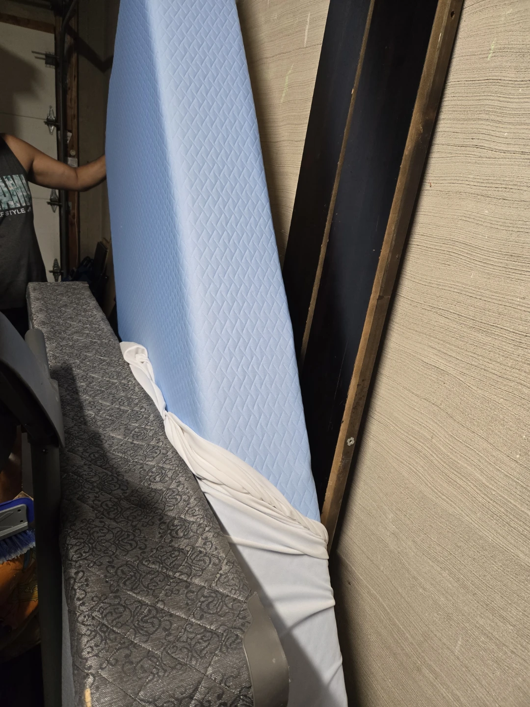 Blue Quilted Mattress Topper twin XL and  a brown twin bed frame - photo 2
