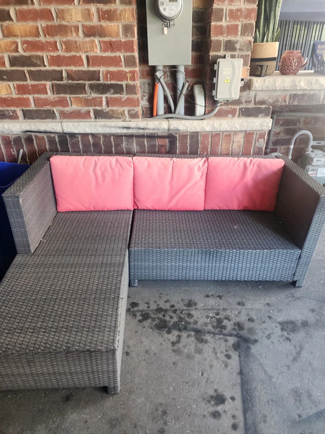 Wicker Sectional Sofa with Pink Cushions