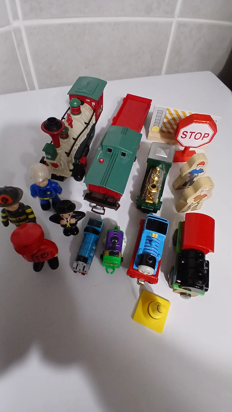 Collection of trains and accessories for $5.00