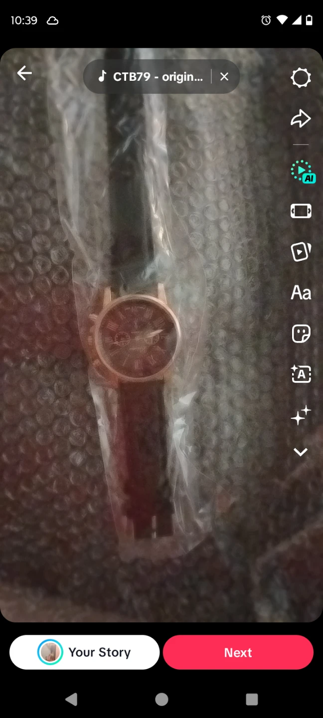 Rose Gold Tone Watch with Roman Numerals