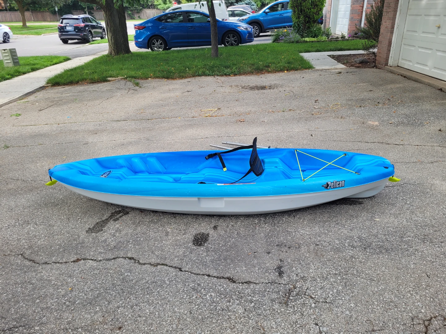 Pelican Sentinel Kayak with Paddle and Roof Rack Mounts