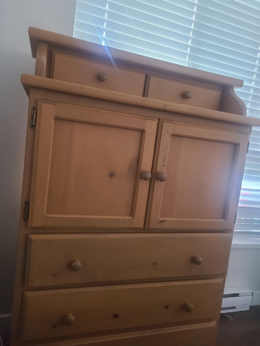 Wooden dresser with drawers and cabinet doors