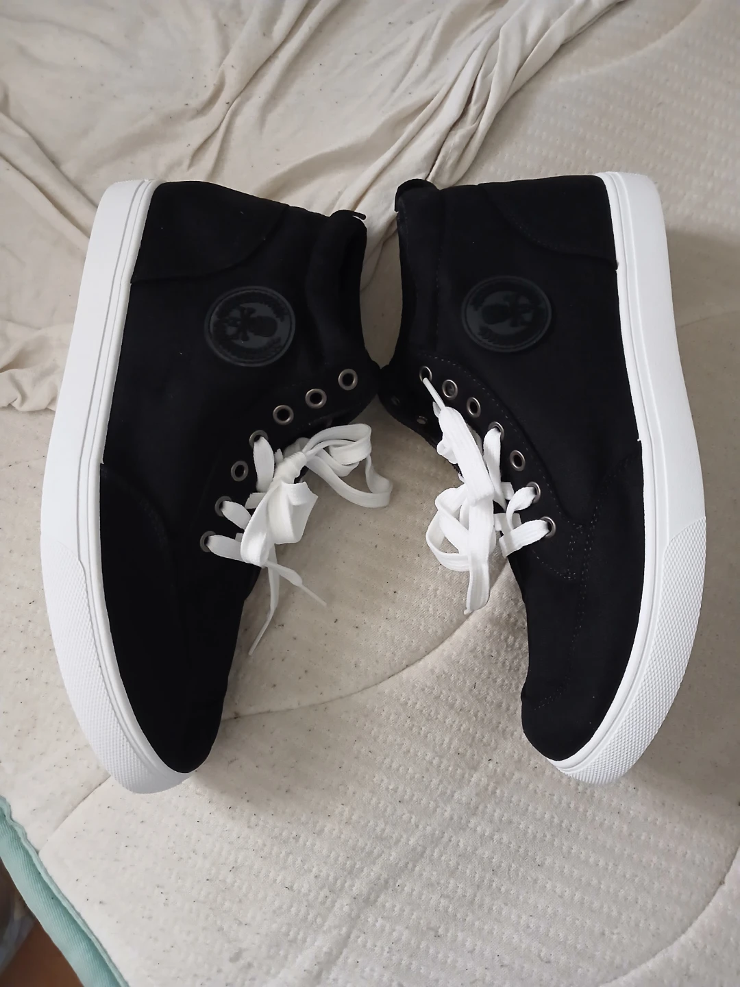 Black High-Top Sneakers With White Soles