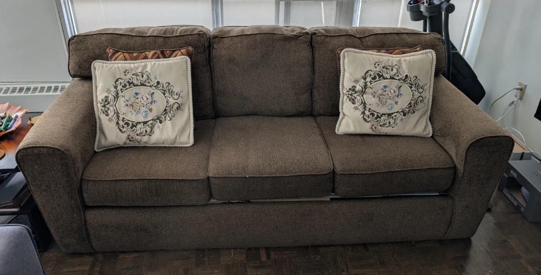 Leon's Brown upholstered couch with decorative pillows - photo 4