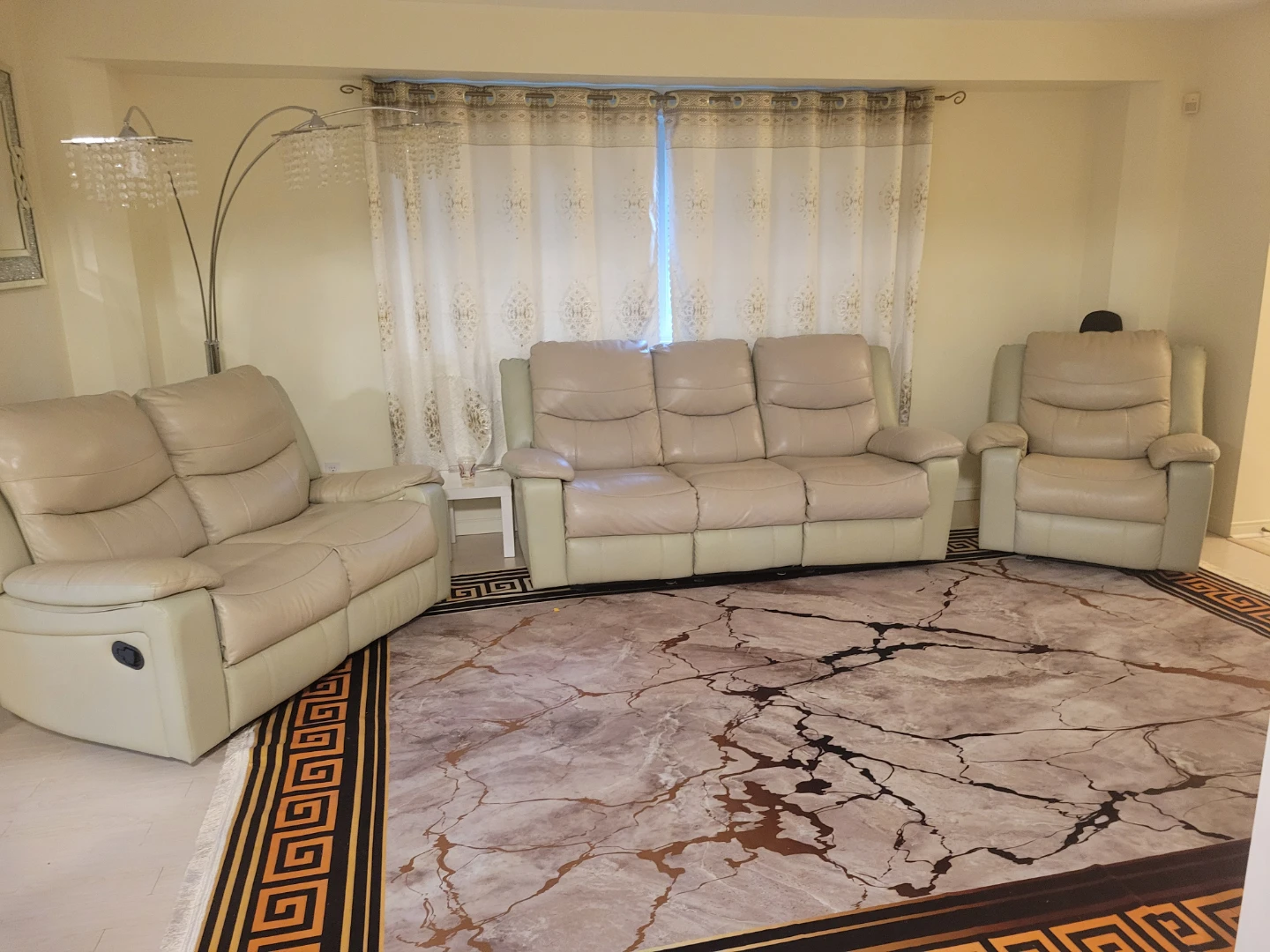 Set of 3 beige leather reclining sofa and chairs