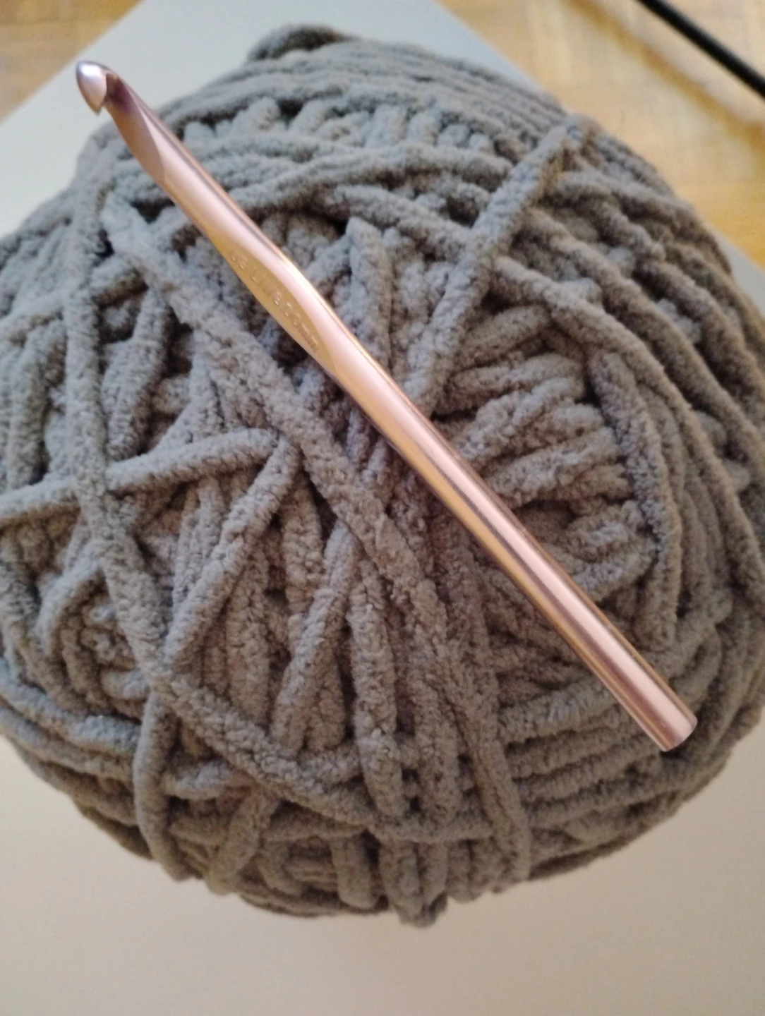 Grey Chunky Yarn Ball with Crochet Hook