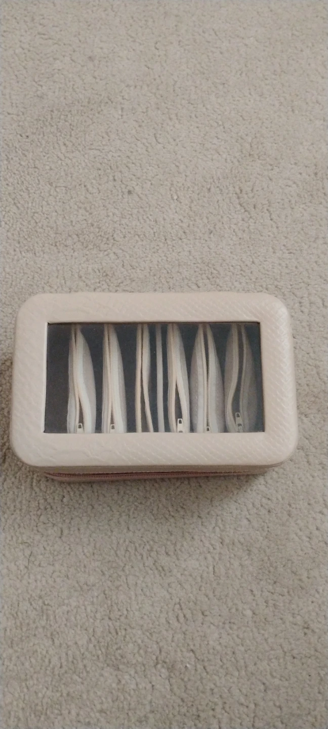 Beige Jewelry Organizer with Zippered Compartments