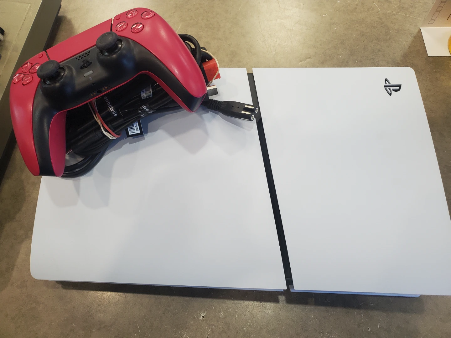 PlayStation 5 Console with Red Controller