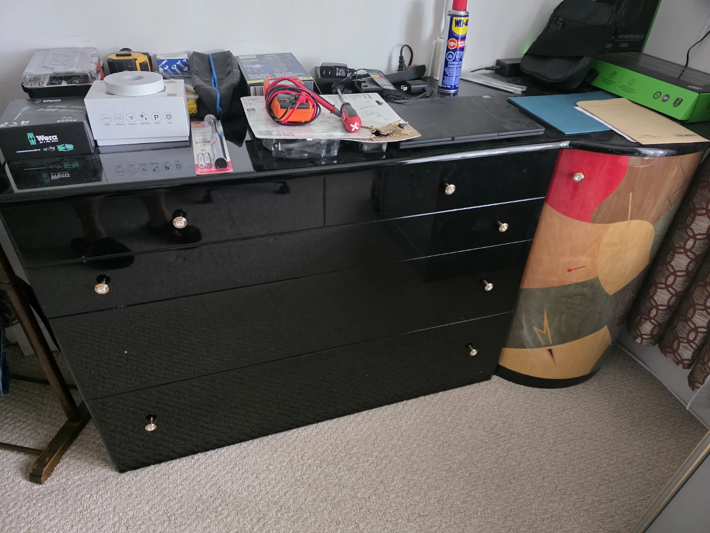 Black Dresser with Decorative Side Panel