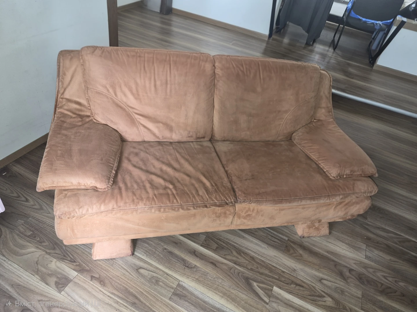 Brown upholstered sofa