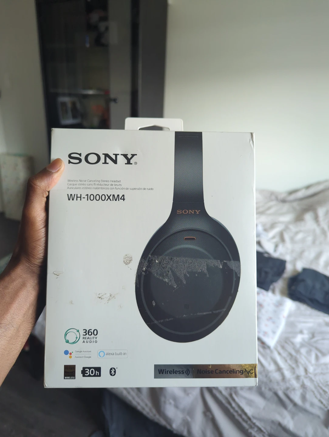 Sony 1000XM4 wireless headphones with carrying case