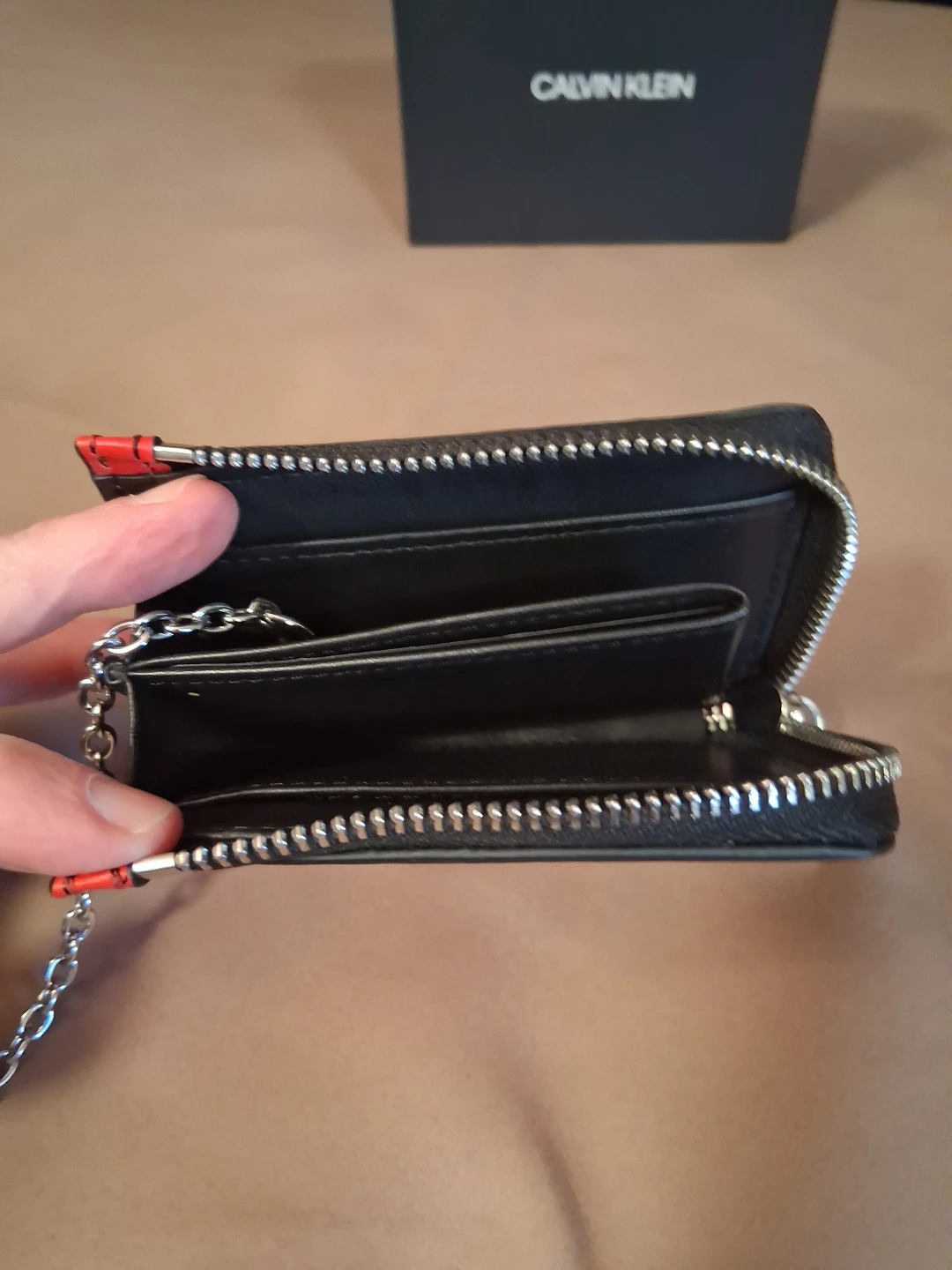 Calvin Klein shorts, red leather wallets and touque - photo 5