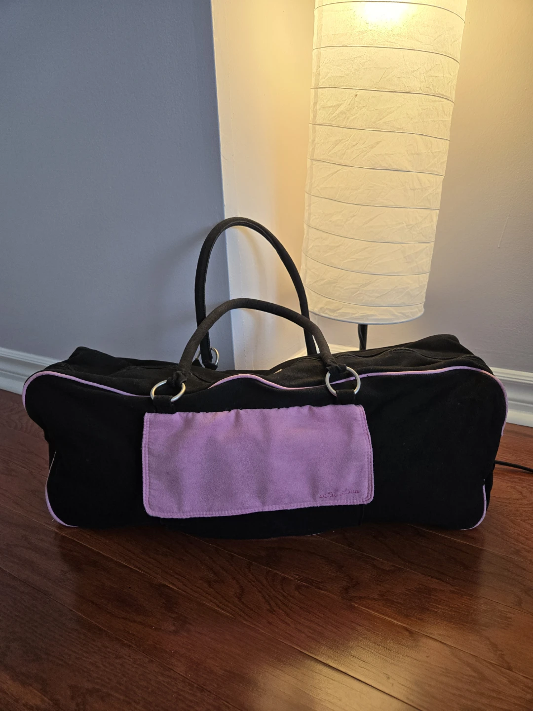 Black and pink duffel bag