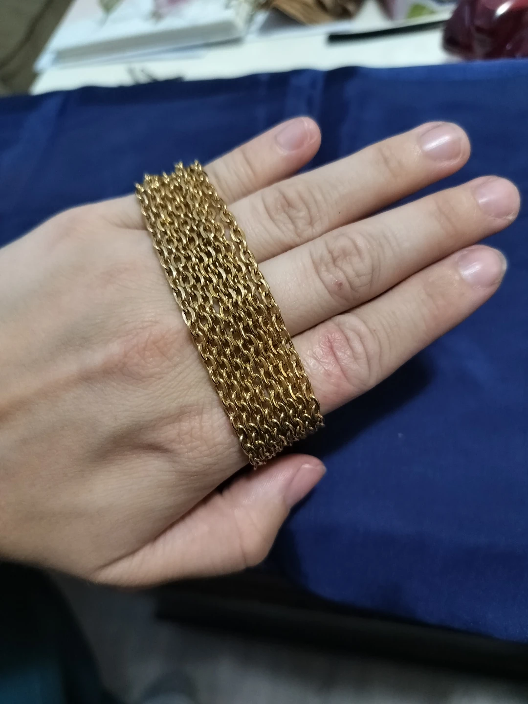 Gold coloured layered chain bracelet