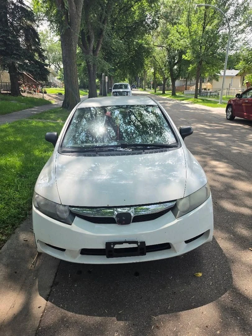 2010 Honda Civic. Great go to ride. High mileage. - photo 3